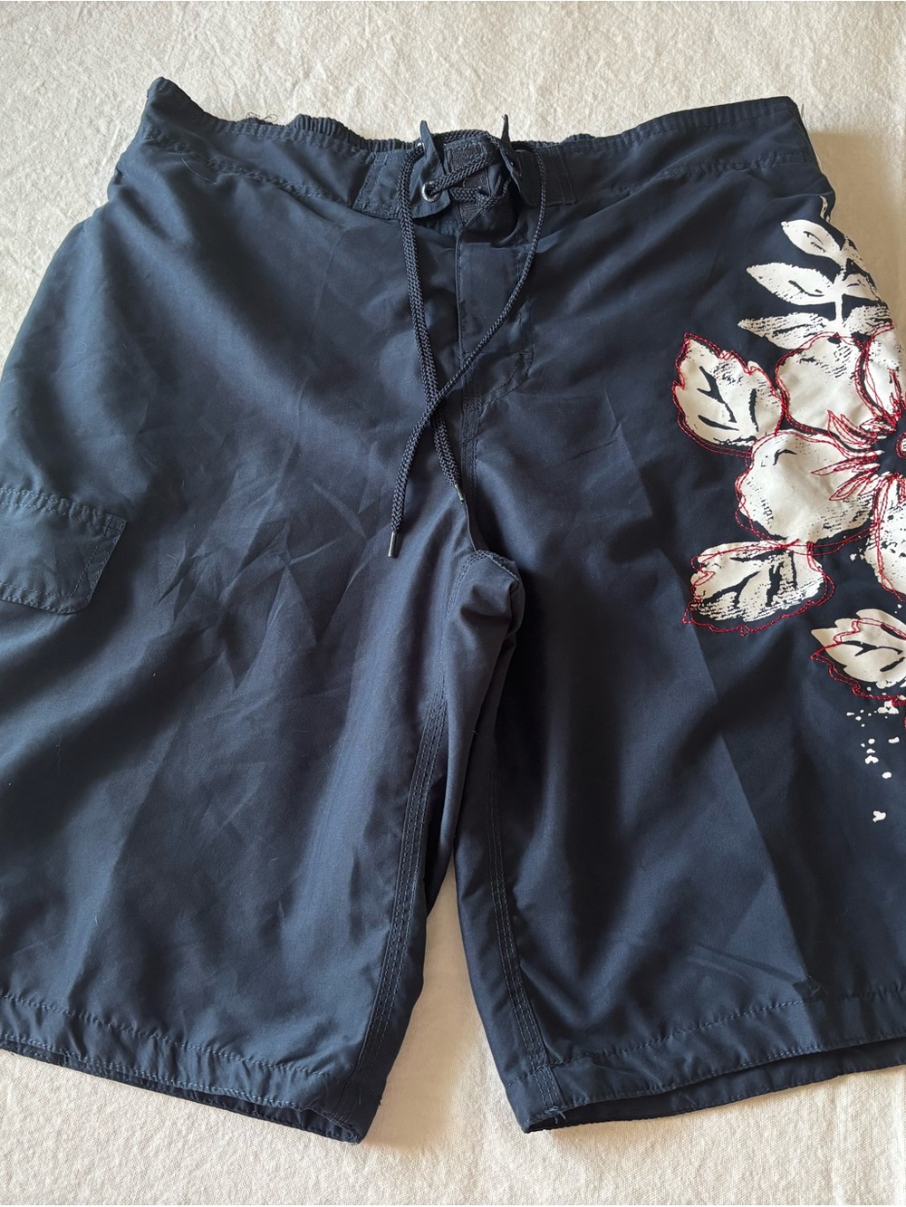 Pacifica Navy Swim Trunks with White & Red Floral Accent